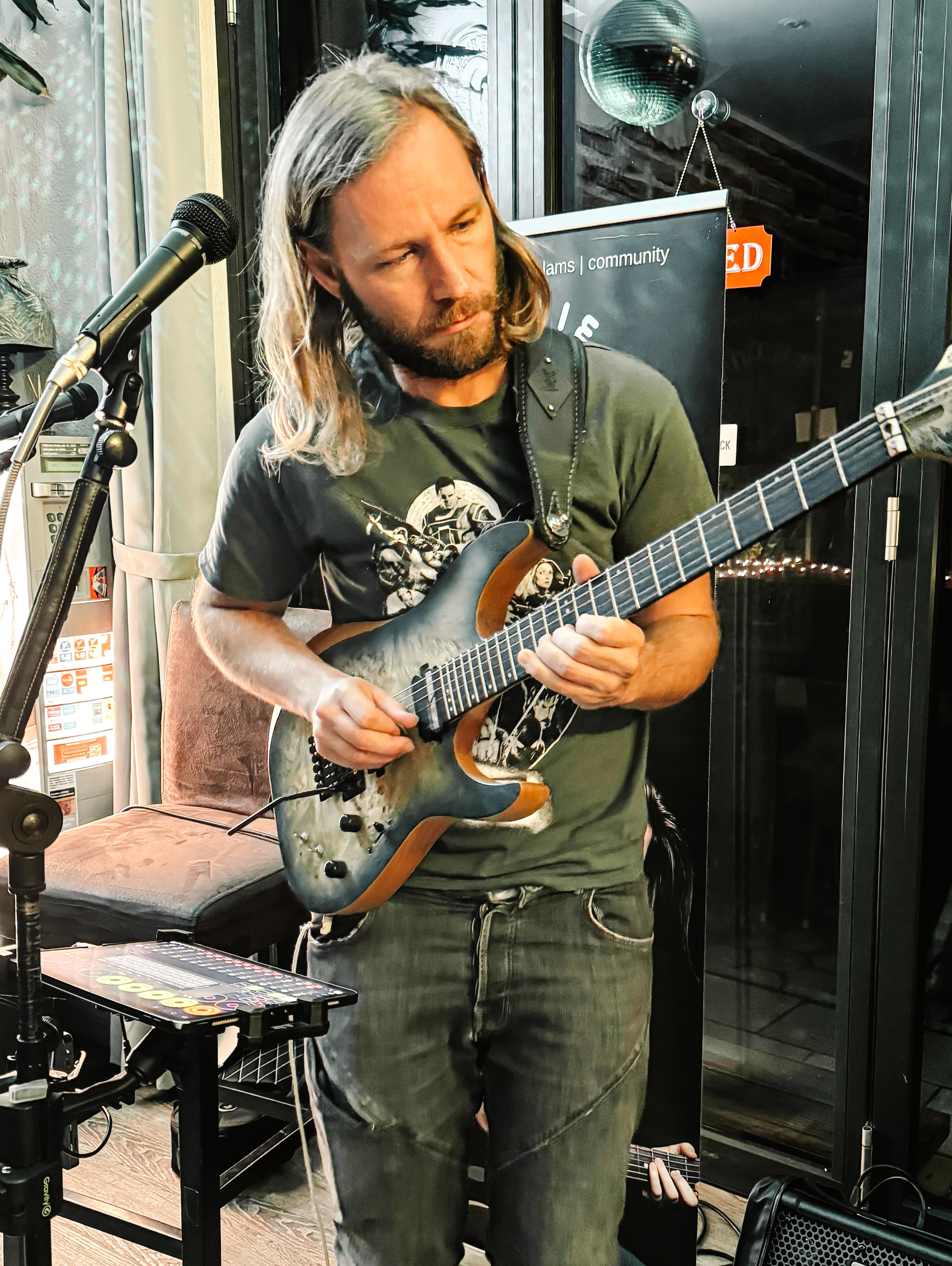 Bio Picture DannyURocks Playing the guitar